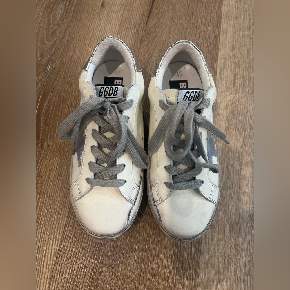 White & silver star sneakers